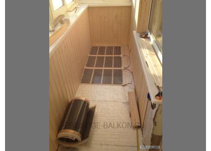 Теплое остекление лоджии пластиковыми окнами с теплым пленочным ИК полом в Подольске