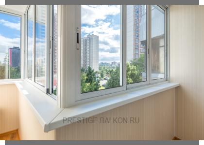 Холодное раздвижное остекление алюминиевыми окнами с отделкой стен и потолка ламинированными панели в Подольске